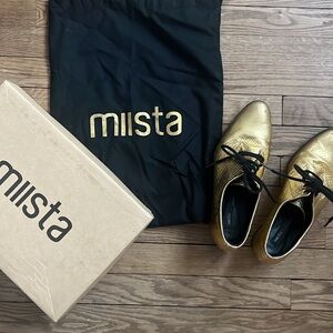 Miista Metallic Gold Lace-Up Oxfords with Black Laces